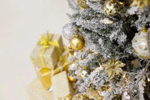 Decorated Christmas tree with golden patchwork ornament artificial gold and Stock Photos