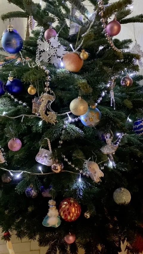 Decorated Christmas tree with illumination. Close-up Stock Footage 145374203