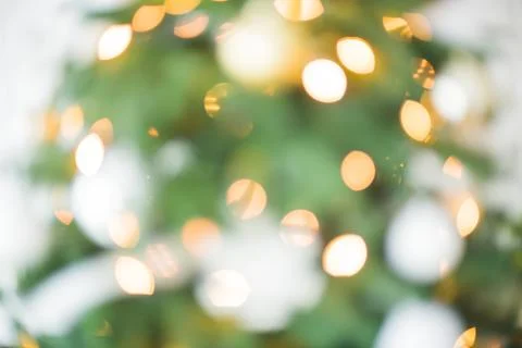 Decorated Christmas tree on lights background Stock Photos