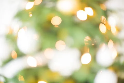 Decorated Christmas tree on lights background Stock Photos