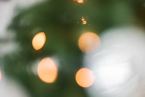 Decorated Christmas tree on lights background Stock Photos
