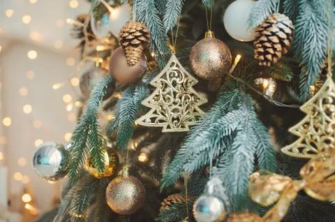 Decorated Christmas tree in rustic and shabby chic style. New Year scene. Close Stock Photos