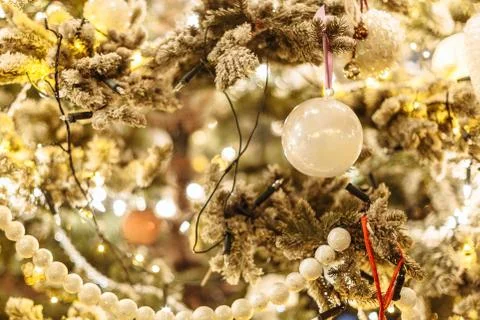 Decorated Christmas tree in rustic style. New Year scene. Close-up Stock Photos