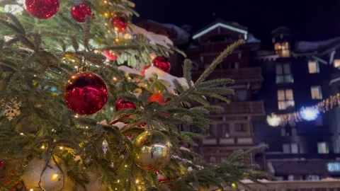 Decorated Christmas tree in a ski resort Stock Footage 337261930