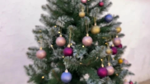 Decorated christmas tree on the street hitting the camera, christmas background Stock Footage 255037883