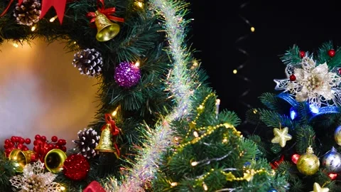 Decorated Christmas trees of different sizes and gifts near the Christmas wreath Stock-Footage 284205334