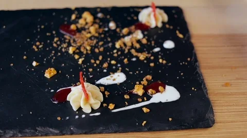 Decorated dessert with a red elements. Dessert in a restaurant Video stock 75416556