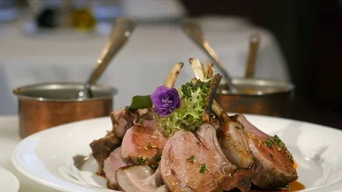 Decorated the dish with steaks Stock-Footage 85428242
