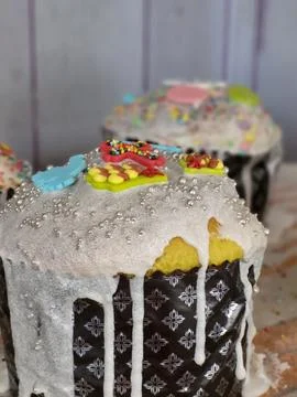Decorated Easter cake with white glaze and festive details Stock Photos