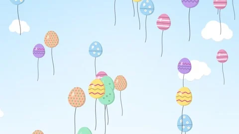 Decorated Easter egg balloons rising through a blue sky with clouds Vídeo Stock 348618688