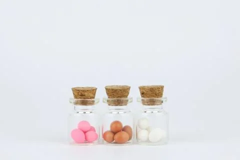 Decorated easter eggs in bottle with white background Stock-Fotos