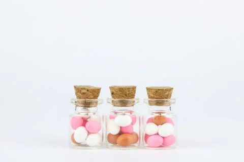 Decorated easter eggs in bottle with white background Stock Photos
