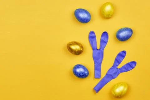 Decorated Easter eggs with colorful balloons Stock Photos