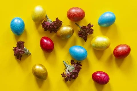 Decorated Easter eggs with dried flowers Stock Photos