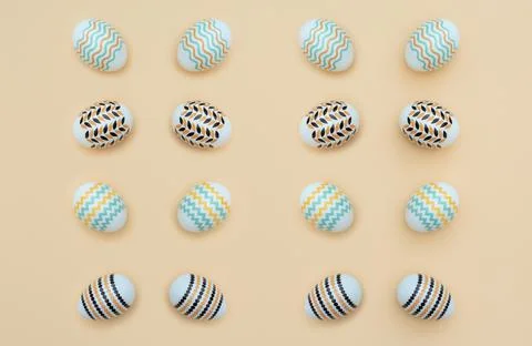 Decorated Easter eggs lie on the yellow background. Happy Easter holiday and  Stock Photos