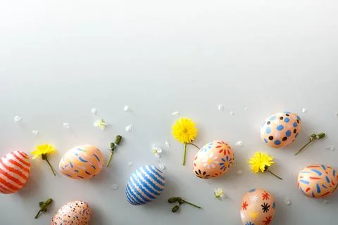 Decorated Easter Eggs with Spring Flowers Border Stock Photos