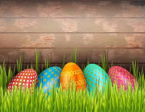 Decorated Easter eggs on wooden background with green grass and copy space. Stock Illustration