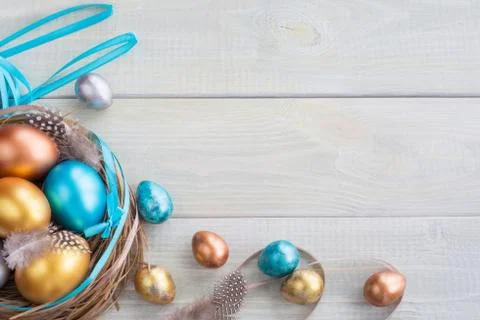 Decorated easter nest with eggs Stock Photos