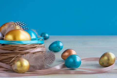 Decorated easter nest with eggs Stock Photos