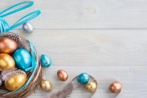 Decorated easter nest with eggs Stock Photos