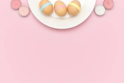 Decorated egg on a plate with candles. Easter background Stock Photos