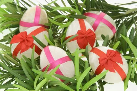 Decorated egg shaped stones for easter Stock Photos