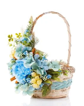 Decorated empty wicker basket on a white background Stock Photos