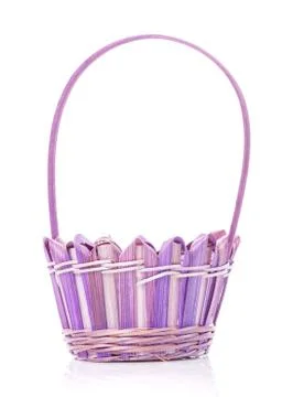 Decorated empty wicker basket on a white background Stock Photos
