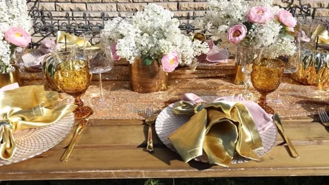 Decorated festive table laid for summer garden party Stock Footage 140178197