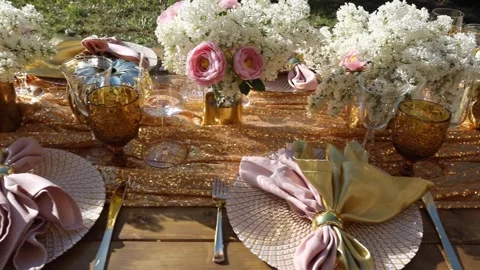 Decorated festive table laid for summer garden party Stock Footage 140178200