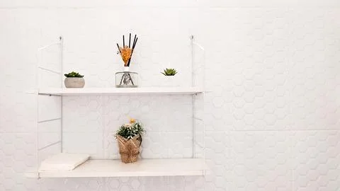 Decorated Floating Shelf inside Bathroom Stock Photos