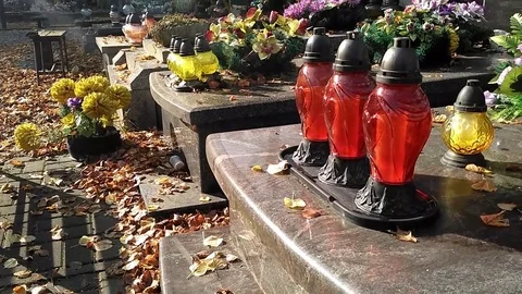 Decorated graves at catholic cemetery Stock Footage 81216366