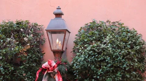 Decorated lamp post in front of pink wall Stock Footage 45533300