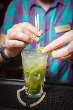 Decorated with lime mojito bartender  Stock Photos