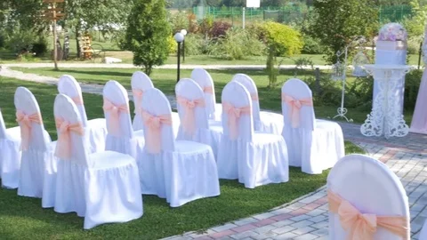 Decorated rows of chairs at the wedding ceremony. 스톡 동영상 80720975