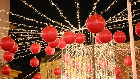Decorated square in city centre at night. Colorful decorations, balloons Stock Footage 259919672