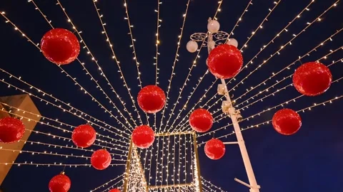 Decorated square in city centre at night. Colorful decorations Stock Footage 263387234