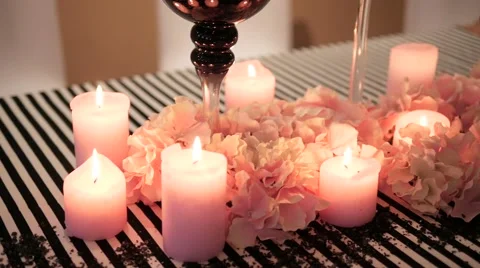 Decorated table with candles and decorations. beautiful vases Stock Footage 62672713