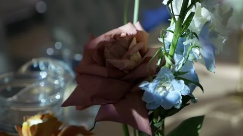 A decorated table with glasses and flowers in a restaurant at a banquet. Stock Footage 334120356