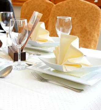 Decorated table in restaurant waiting for two person Stock Photos