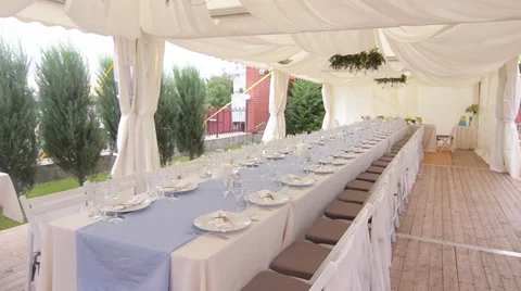 Decorated table for a wedding dinner, beautiful table setting Stock Footage 63032639