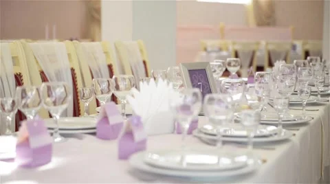 Decorated table for a wedding dinner, beautiful table setting Stock Footage 63032840