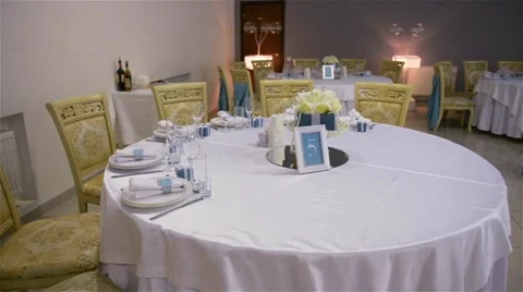 Decorated table for a wedding dinner, beautiful table setting Stock Footage 63033176