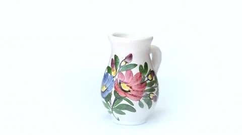 A decorated vase  rotates on white Stock-Footage 35520873