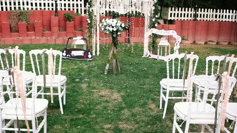 Decorated wedding arch. Wedding ceremony in the woods. Stock Footage 125350297