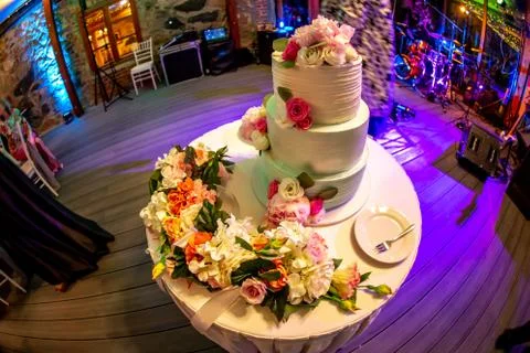 Decorated wedding cake on the table. Stock Photos