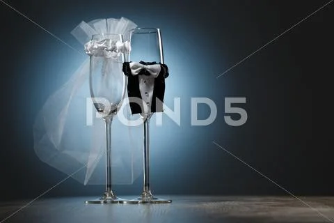 Decorated wedding champagne glasses Stock Photos