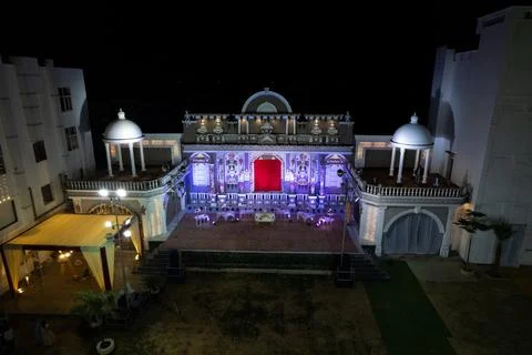 Decorated wedding reception stage at a wedding resort in India. Stock Photos