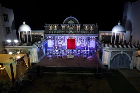 Decorated wedding reception stage at a wedding resort in India. Stock Photos