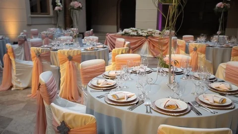 Decorated wedding table with with flowers  and glasses in the restaurant Stock Footage 105002106